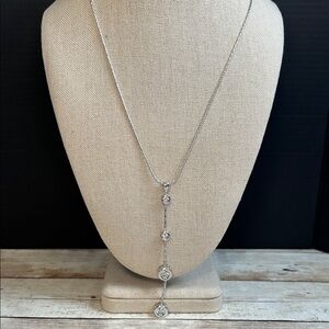 Elegant 925 Silver Necklace with Graduating CZ Drop Pendant